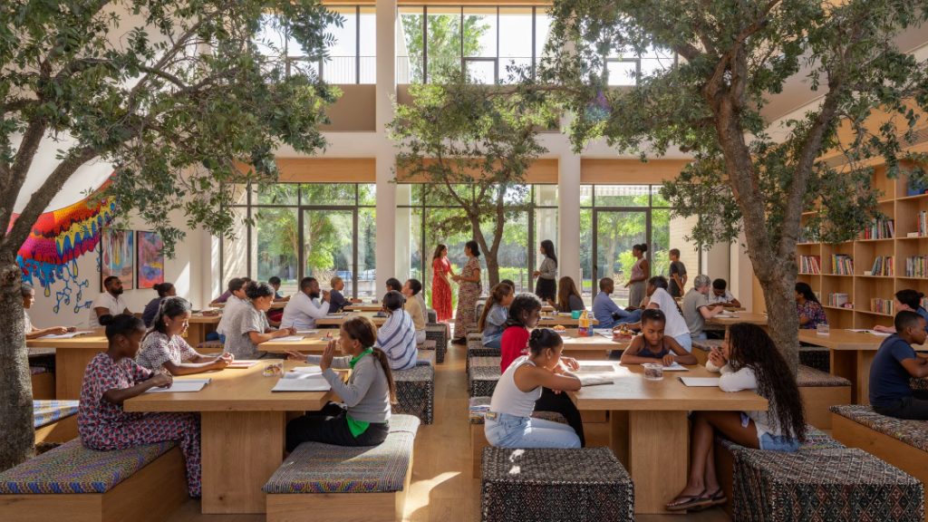 Children reading and learning together in a bright, colorful learning space